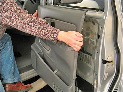 Removing the door panel.