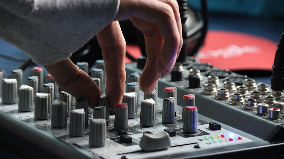 Making a delicate adjustment on a mixer