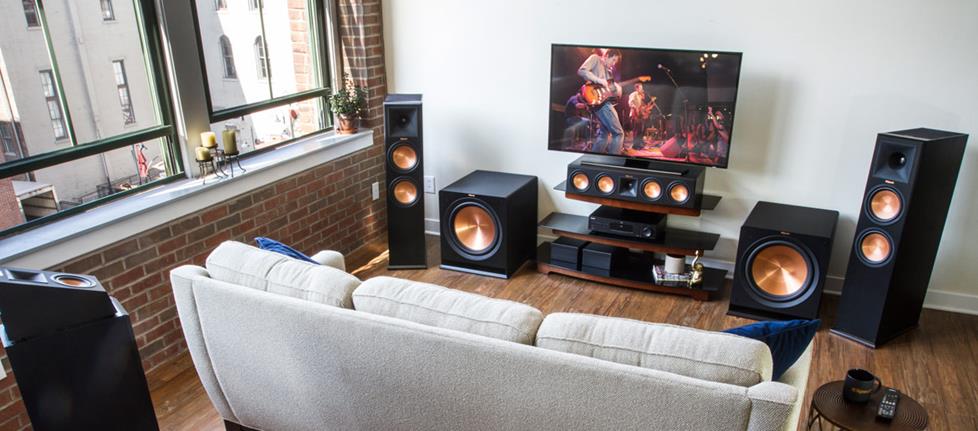 A living room home theater system with Klipsch speakers
