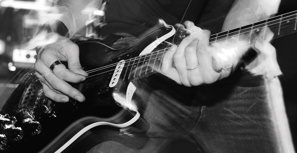 electric guitar player shredding