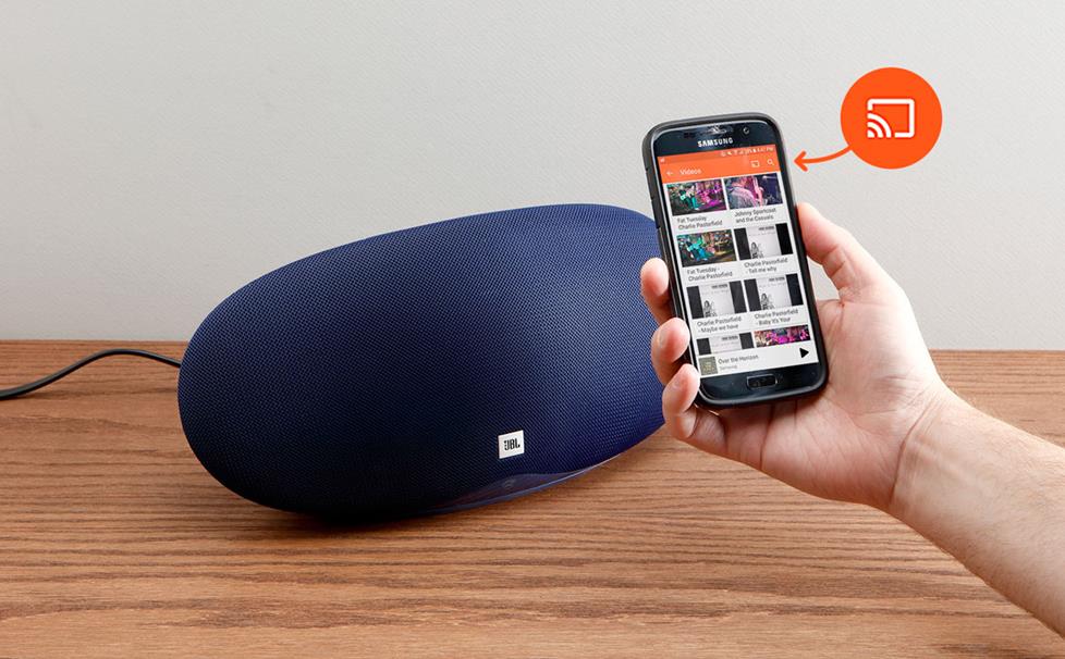 Holding phone with powered speaker