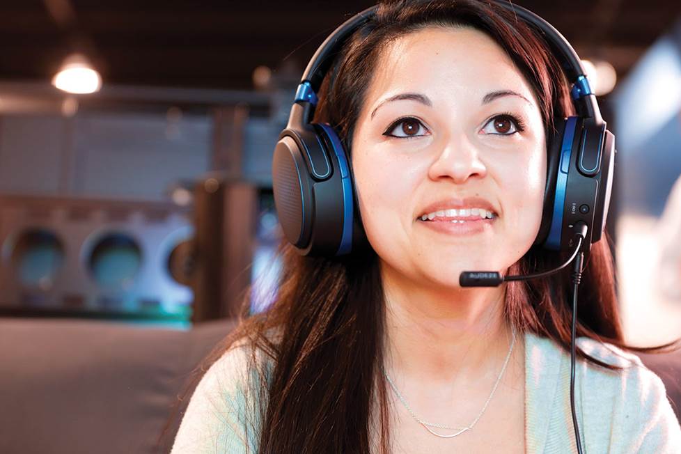 Woman wearing gaming headphones