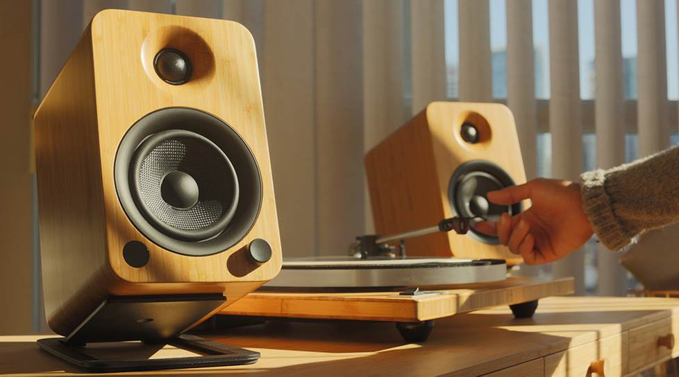 Bamboo Kanto YU4 speakers connected to a turntable