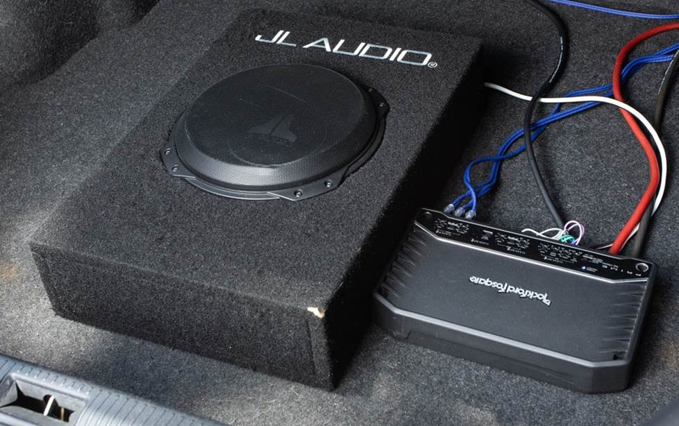 JLAudio sub and RF amp in trunk.