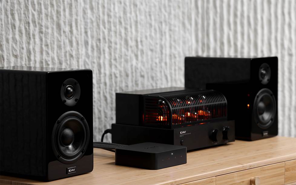 WiiM Pro Plus hooked up to an amplifier and speakers.