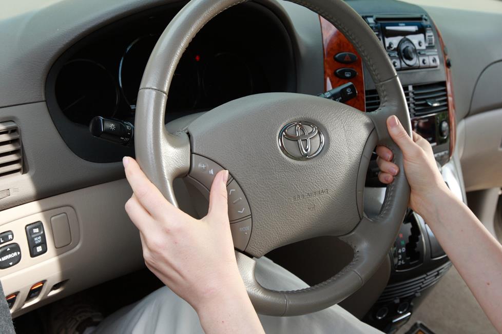 Steering wheel audio controls in a 2006 Toyota Sienna XLE