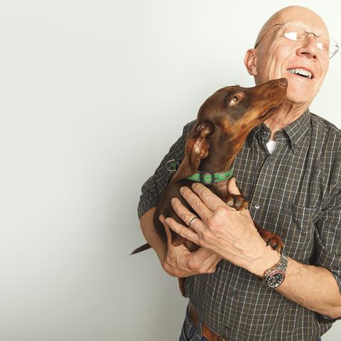 Our CEO, Bill, is a huge animal lover. His buddy Enzo smothers him with kisses during a recent photo shoot.