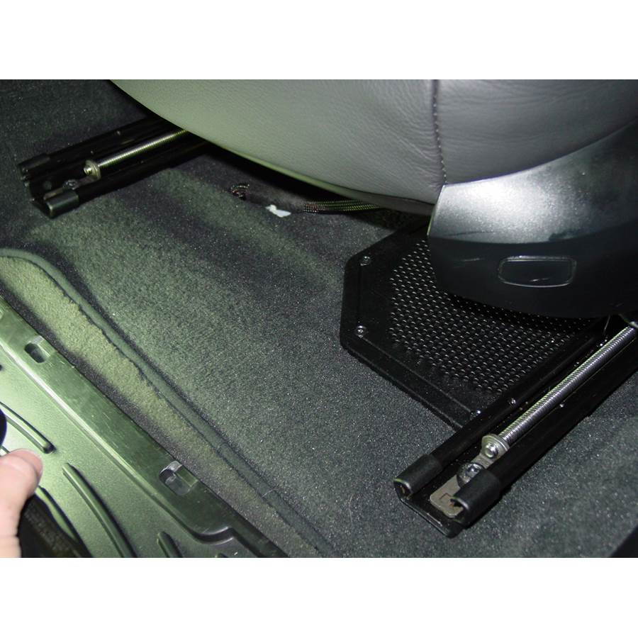 2010 BMW 3 Series Under front seat speaker location