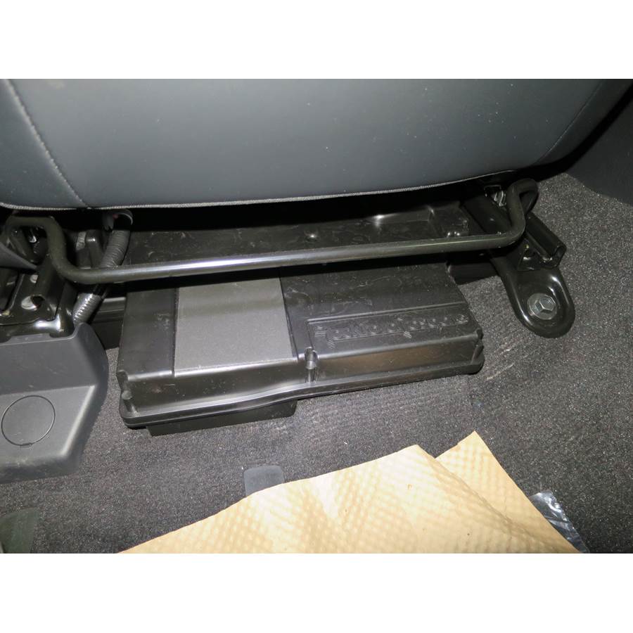 2016 Nissan Titan XD Under front seat speaker location