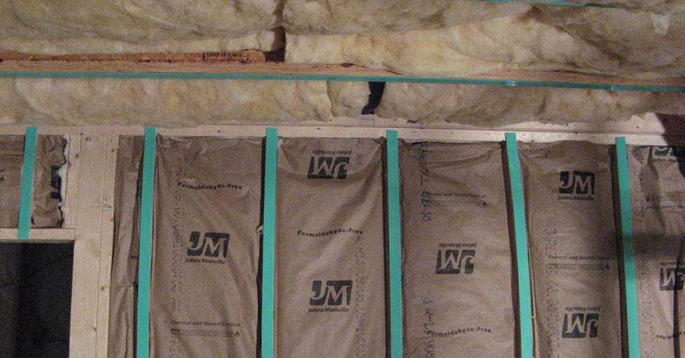 Framed wall, with insulation and foam tape