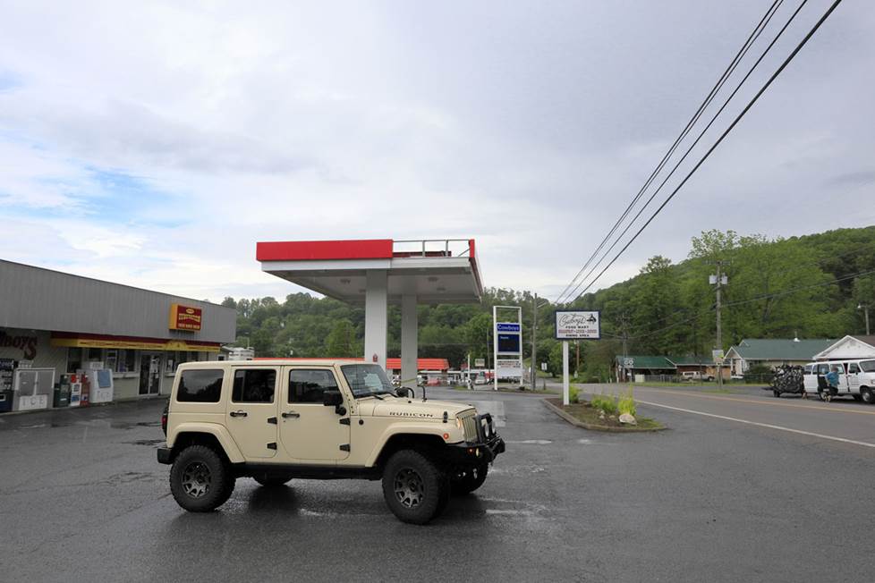 Starting the journey at a gas station on a cloudy day.