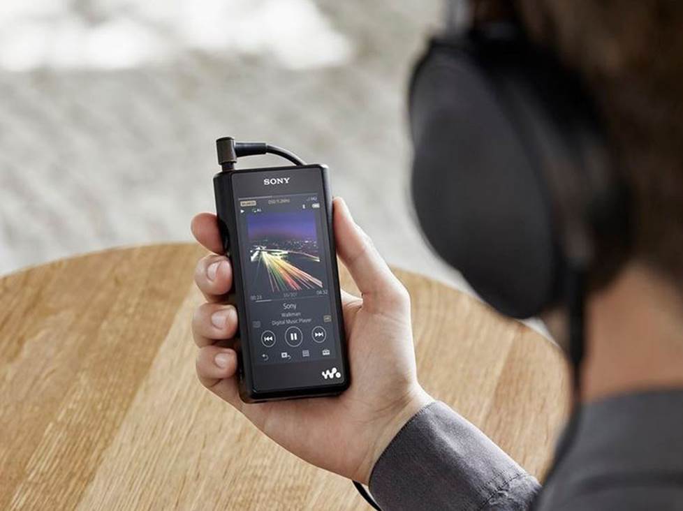 person using a portable high-res music player