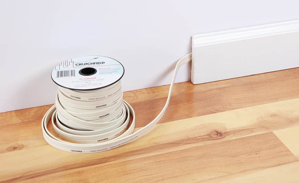 running flat speaker wire behind baseboard