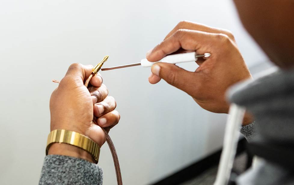 attaching a banana connector to speaker wire