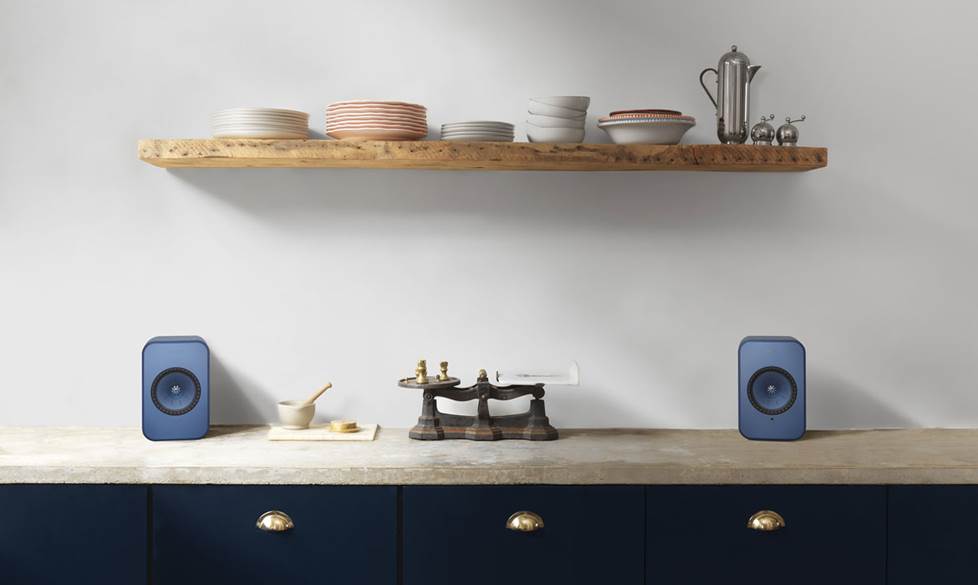KEF speakers on a counter.
