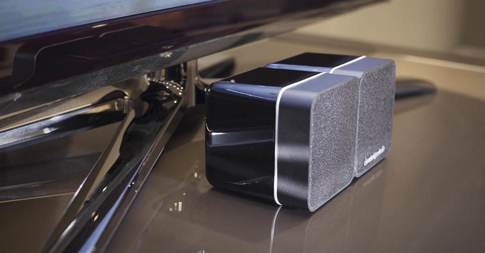 Cambridge Audio's Minx Min 22, an ultra-compact speaker, sitting under a TV