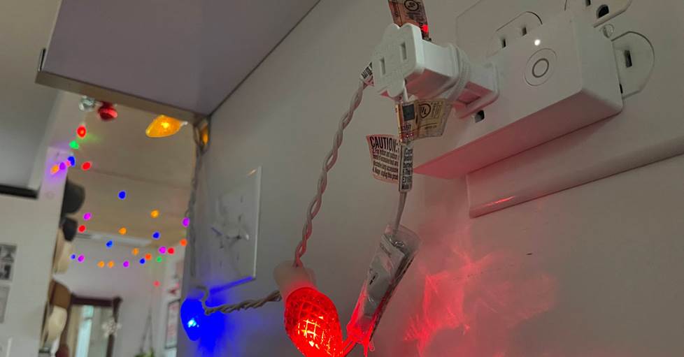 Christmas lights plugged into a Belkin Wemo WiFi smart plug