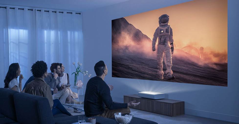 Samsung The Premiere LSP7T 4K ultra short throw projector in a living room