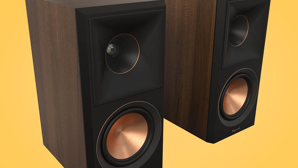 Klipsch Reference Premiere bookshelf speakers on a yellow background