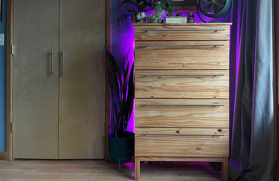 Nanoleaf Essentials smart light strip behind dresser