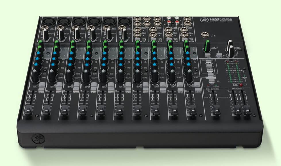 Mackie 1402-VLZ4 mixer on a green background