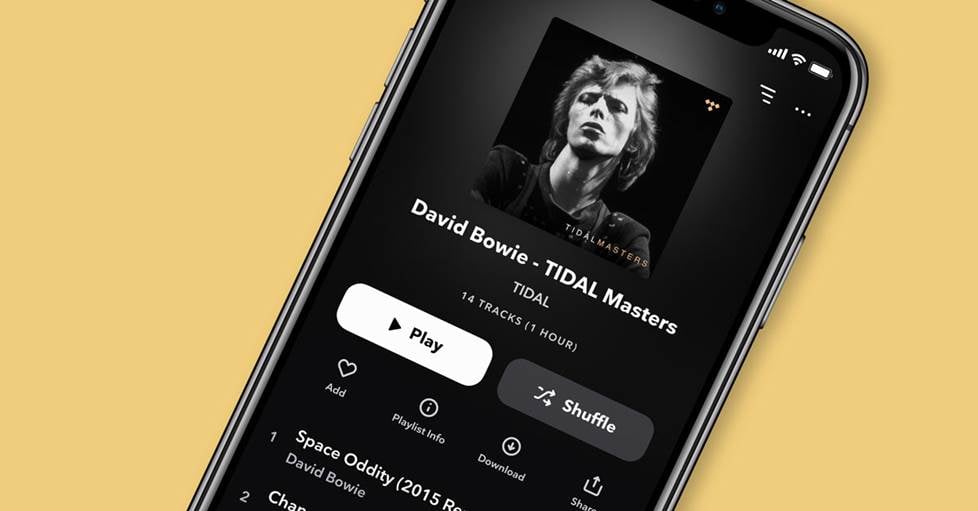 A phone with the Tidal app on screen - showing David Bowie Tidal Master playing