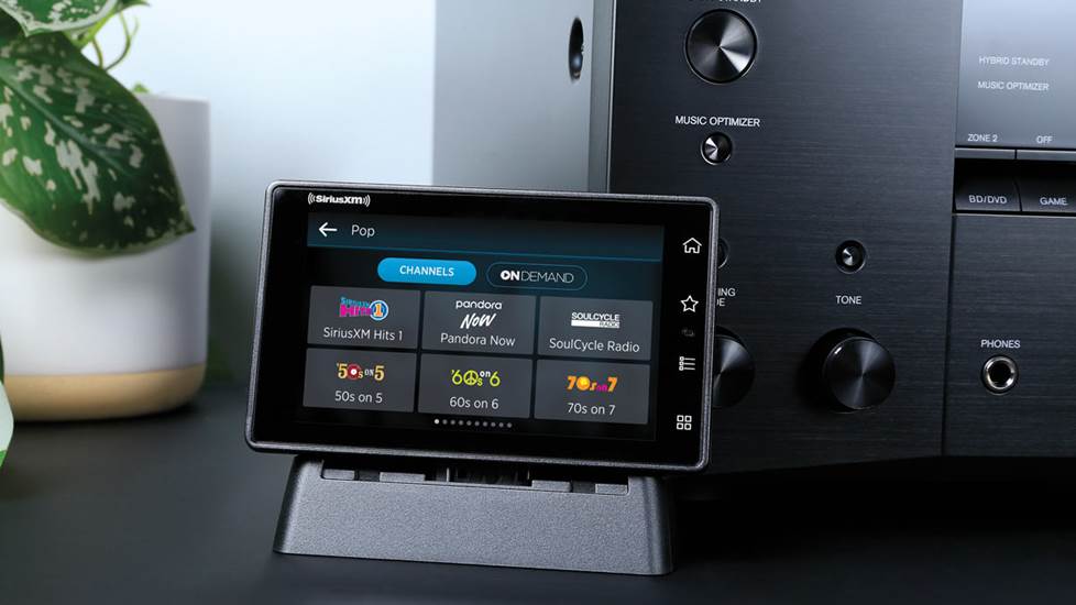 SXM tour tuner connected to a home stereo receiver