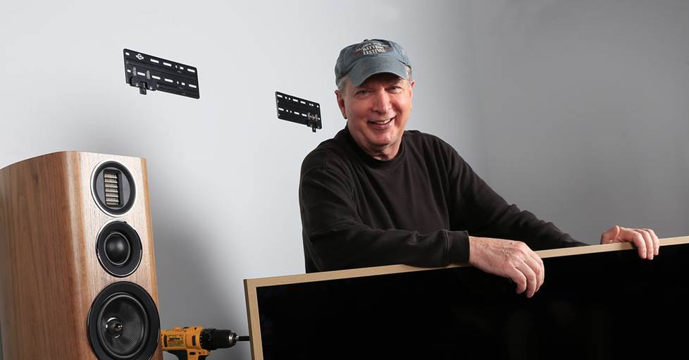 Norm getting ready to wall mount a TV