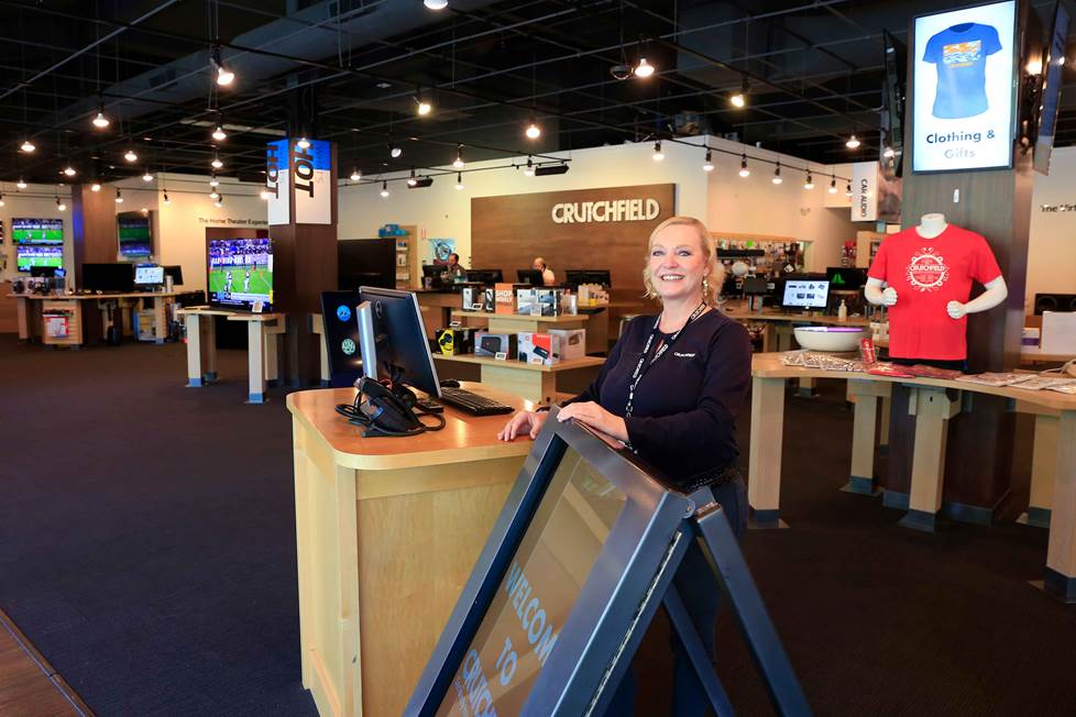 Woman standing in a Crutchfield retail store