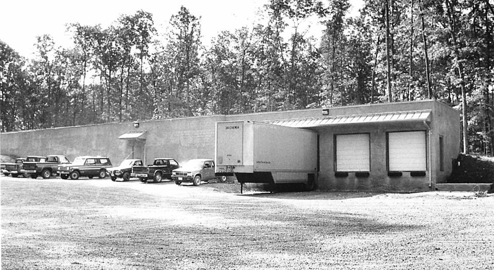 black and white photo of exterior of distribution center circa 1987