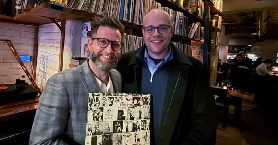 Kevin Flannery standing with Jeff inside the Vinyl Steakhouse