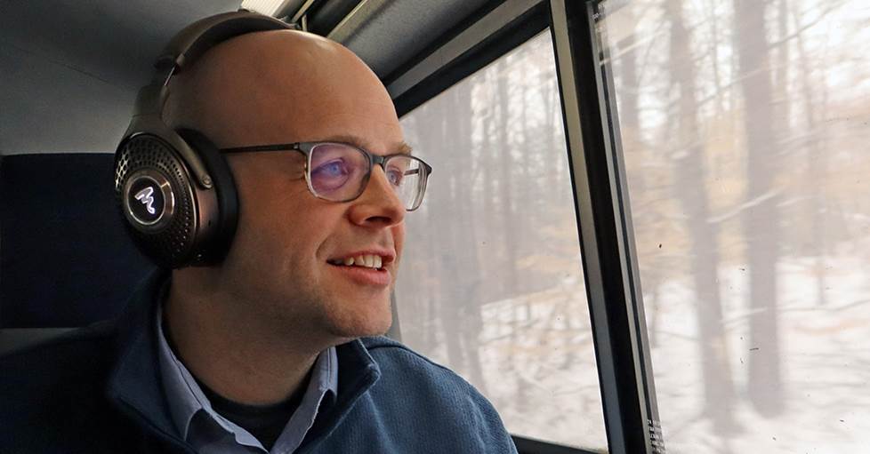 Jeff wearing Focal Bathys MG on train