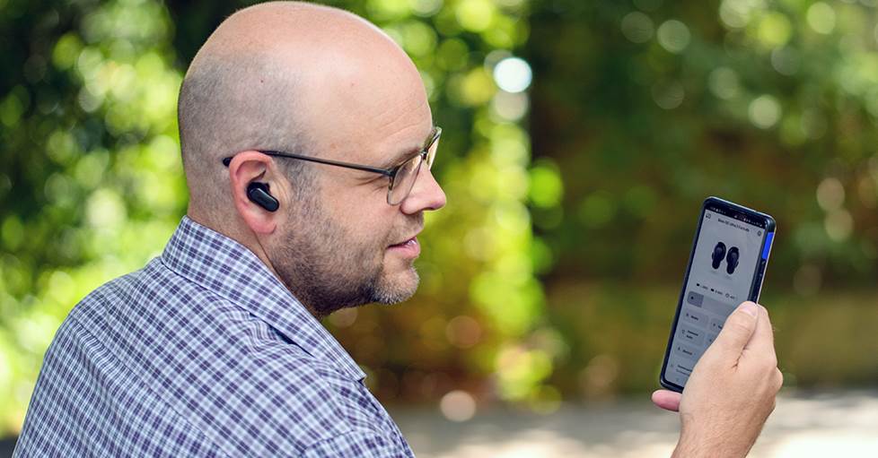 Jeff with the Bose app and QC Ultra 2 earbuds