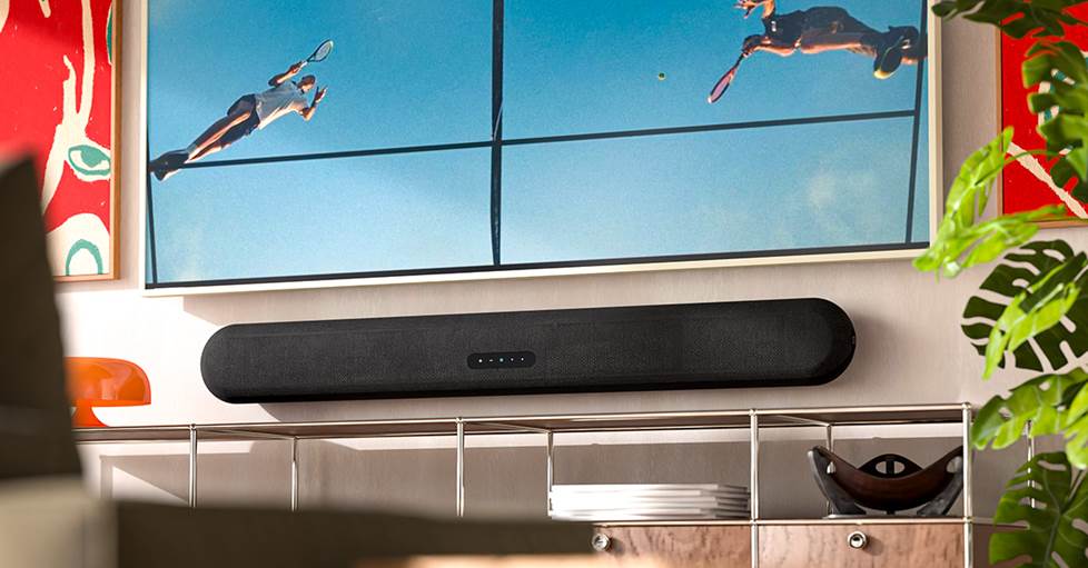 Bluesound PULSE CINEMA Streaming sound bar mounted on a wall