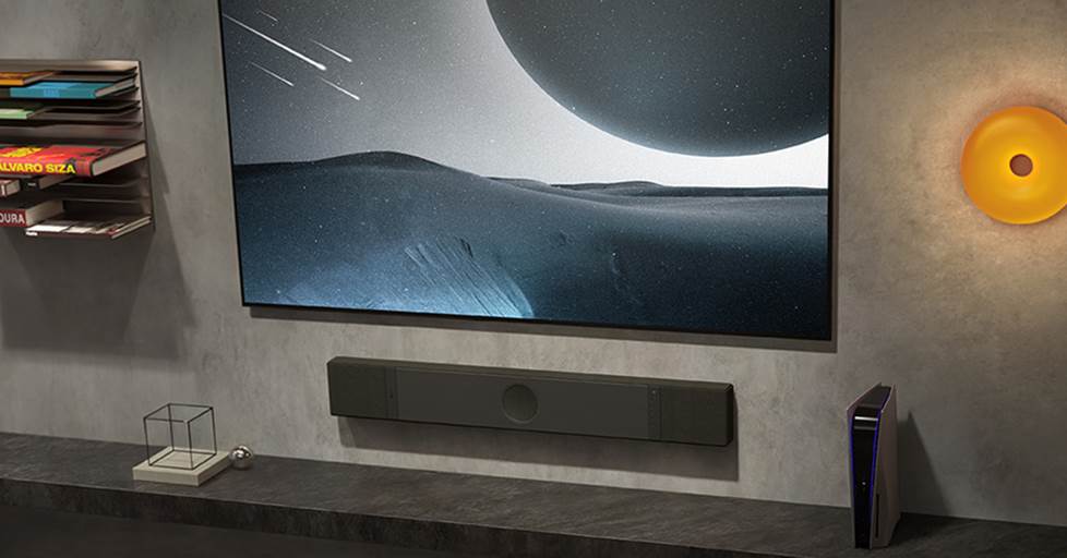 KEF XIO soundbar shown mounted on a wall