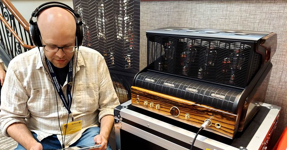 IMAGE OF Jeff listening to A-T headphones
