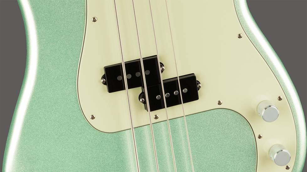 close up of bass guitar pickup