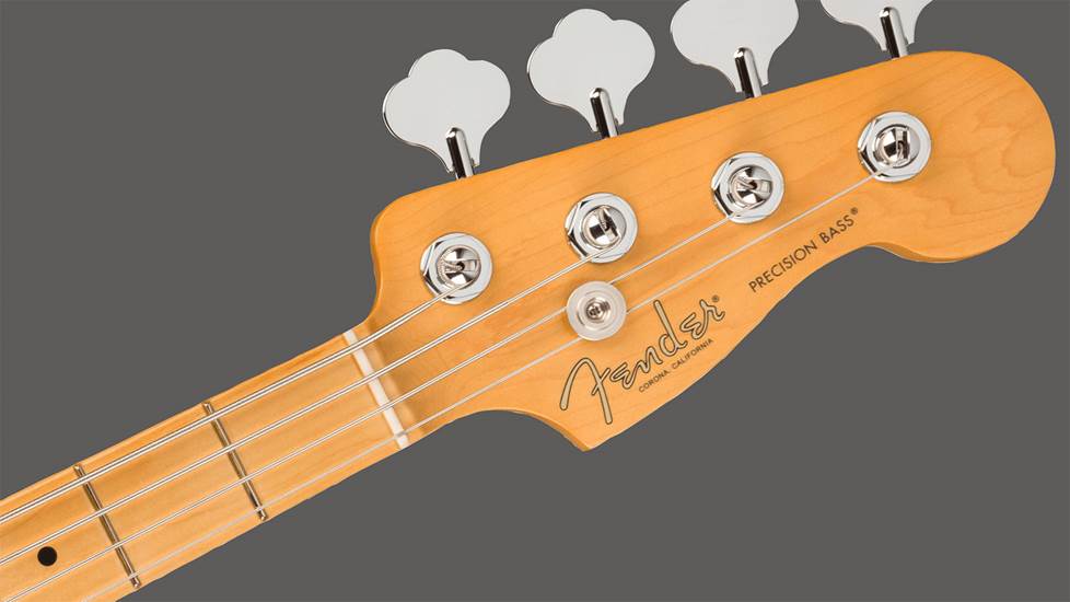closeup of Precision Bass headstock and maple neck