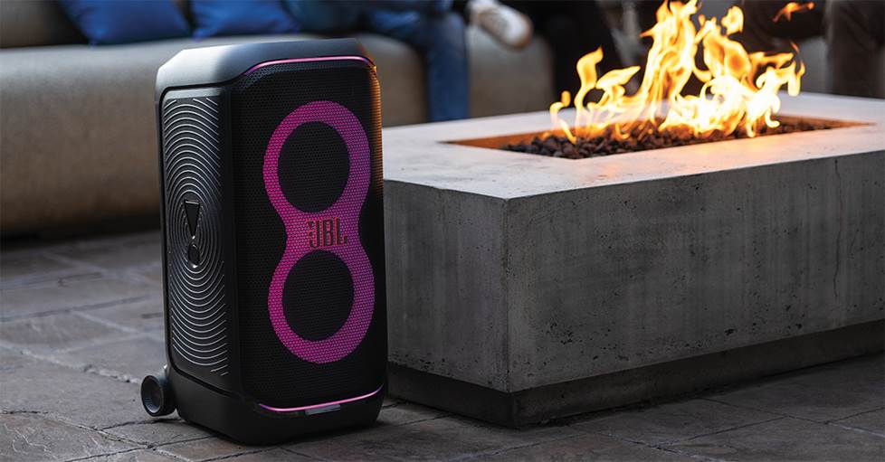 JBL PartyBox Stage 320 next to fire pit