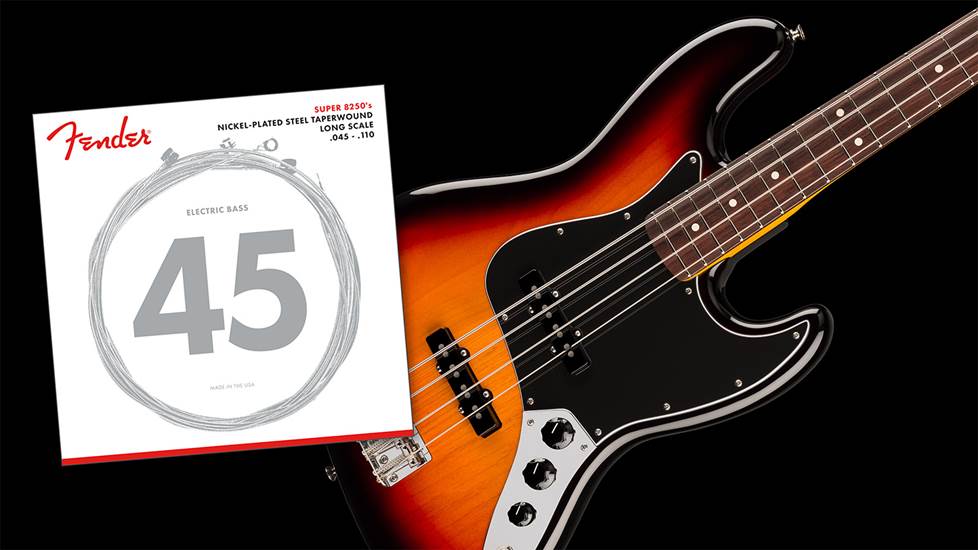 Bass string packaging over photo of man playing bass