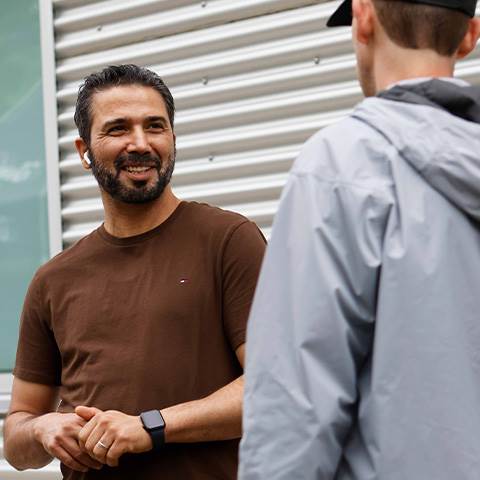 Members of Crutchfield's hard-working shipping crew catch up during a break in the action.