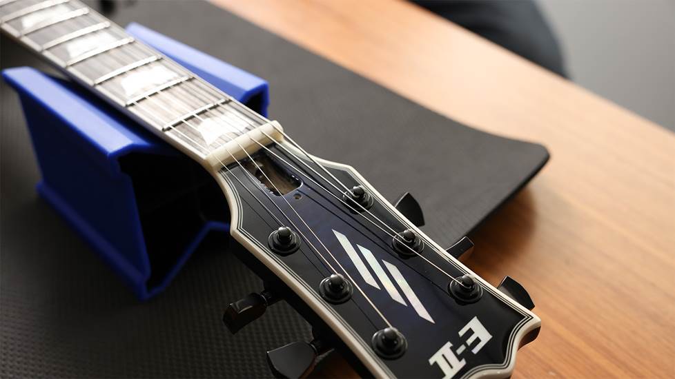 Guitar headstock with truss rod cover off