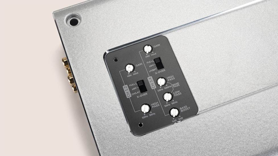 detail of car amp switches on a beige background
