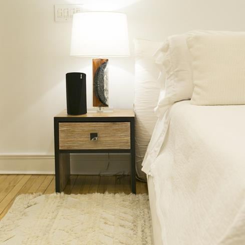 The HEOS 3 HS2 speaker plugs in for power, and can be positioned vertically or horizontally.