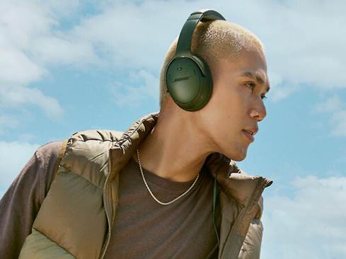 Man wearing Bose QC Headphones