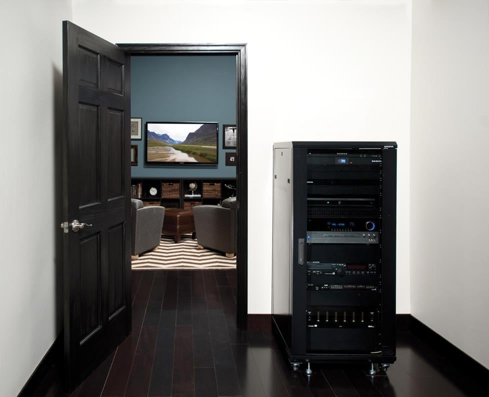 Component rack concealed in closet or adjoining room