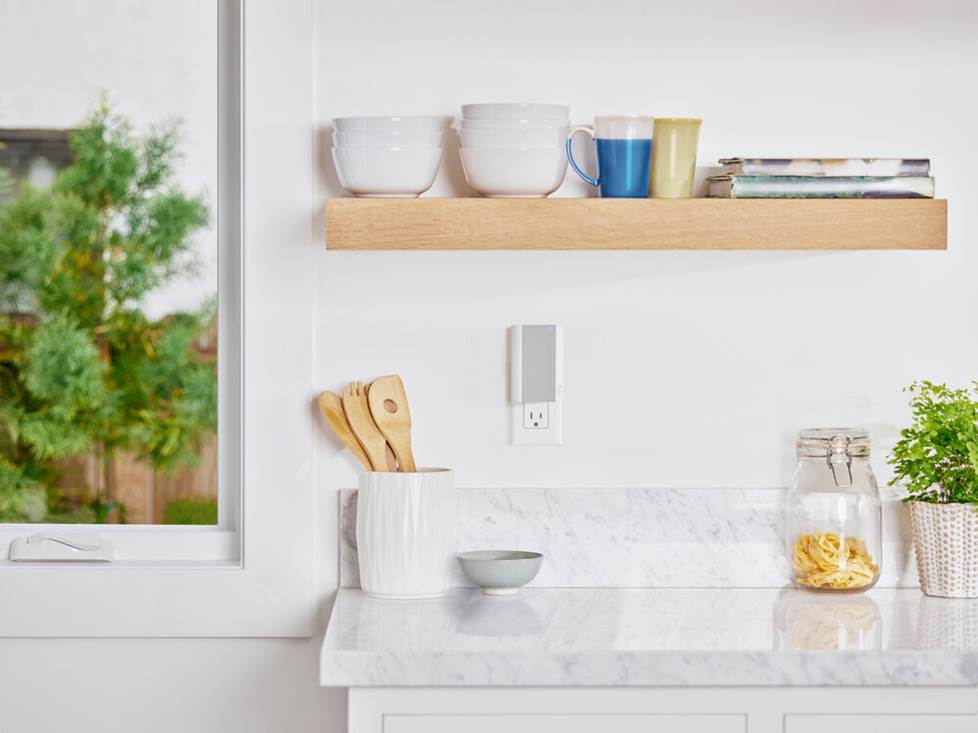 Ring Chime Pro plugged into a wall outlet in kitchen